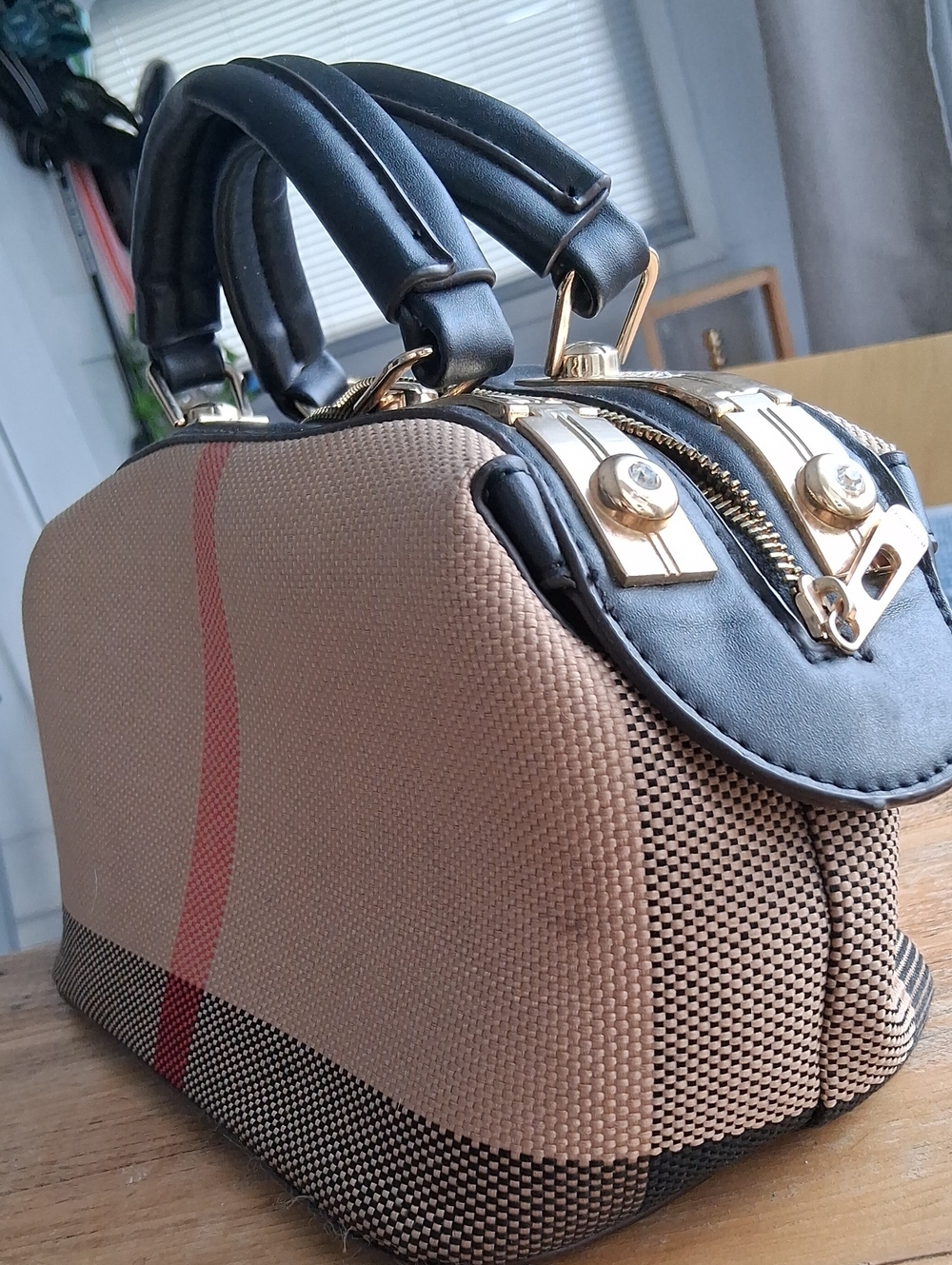 Classic Tan and Black Dome Satchel with Red Accent